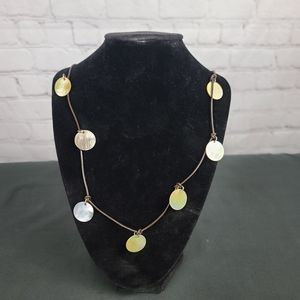 American Eagle Outfitters Necklace: leather and Mother of Pearl Disks.